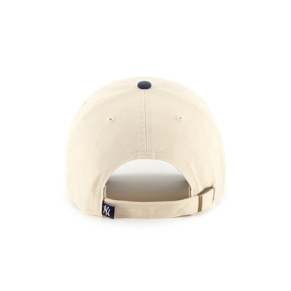 Beige baseball cap with a small logo on the back against a white background