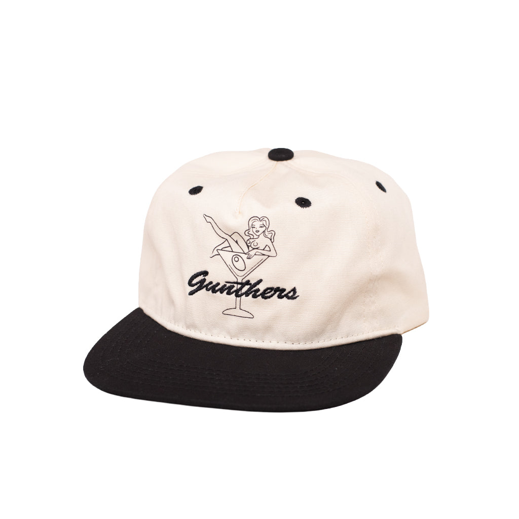 Cap with black and white design on a white background