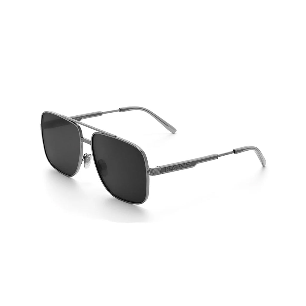 a squared-off metal frame aviator, featuring a metal rim, with modern flat lenses and their signature bold branding on the arm on a white background