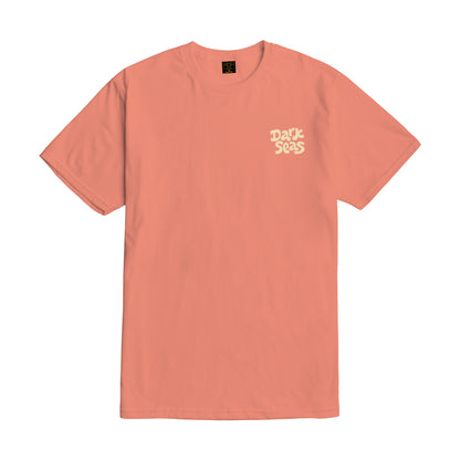 Peach-colored t-shirt with 'Dark Seas' logo on a white background