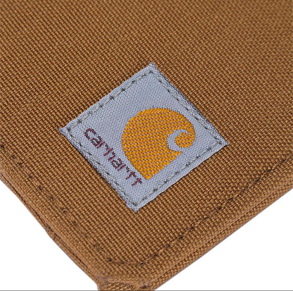 Close-up of a Carhartt logo on brown fabric