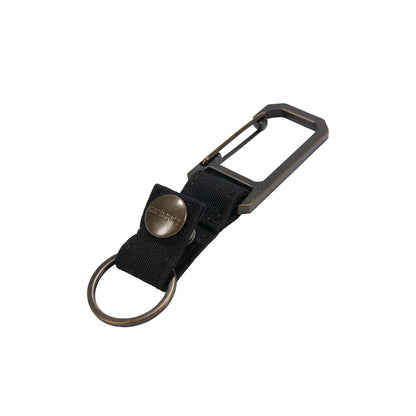 Black keychain with carabiner and clip on a white background