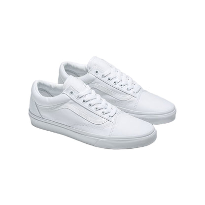 Pair of white sneakers on a light gray background