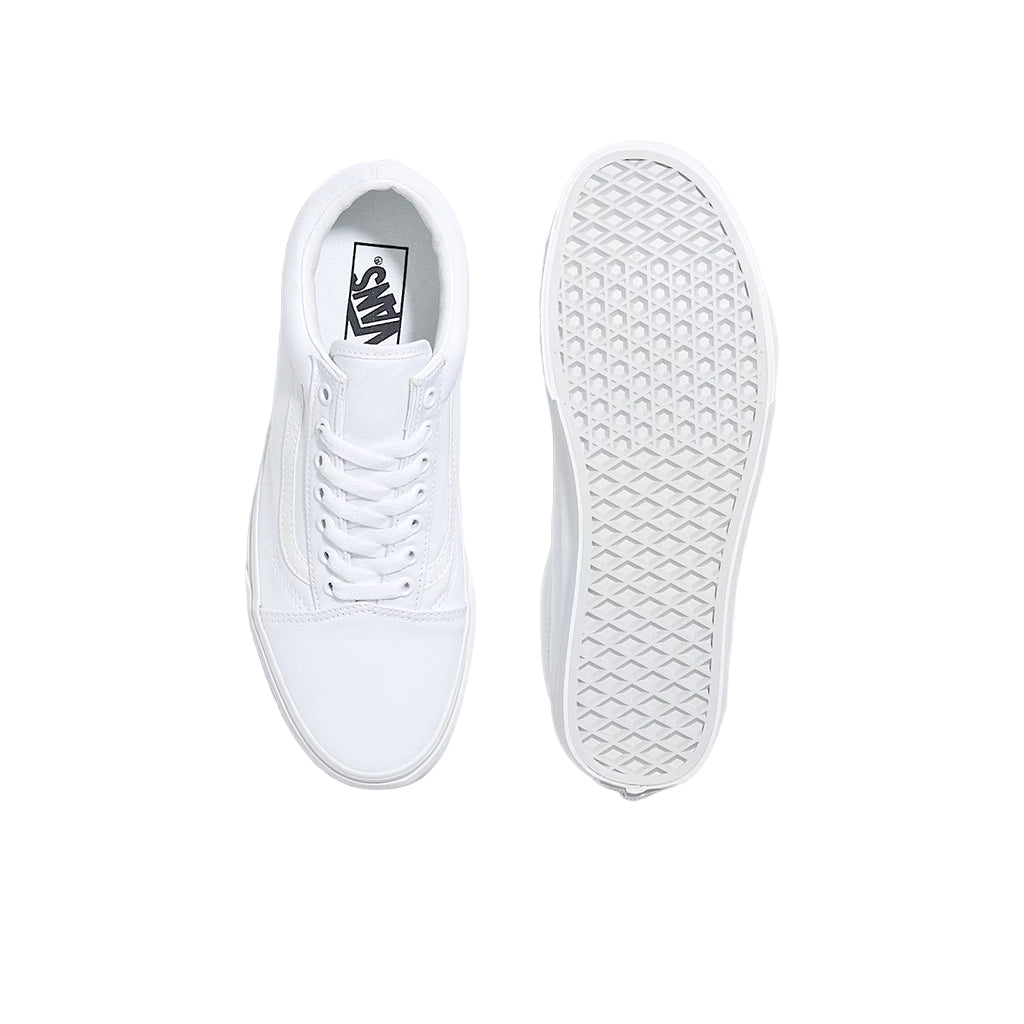 White sneakers with a focus on the sole on a light gray background