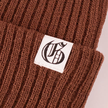 Close up of Old G logo on a brown beanie