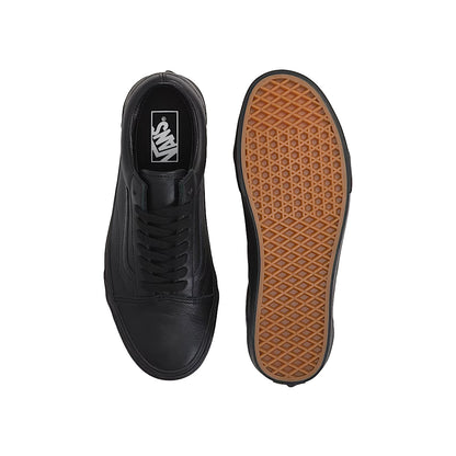 Top and bottom of Black leather Vans Old Skool on a white background 