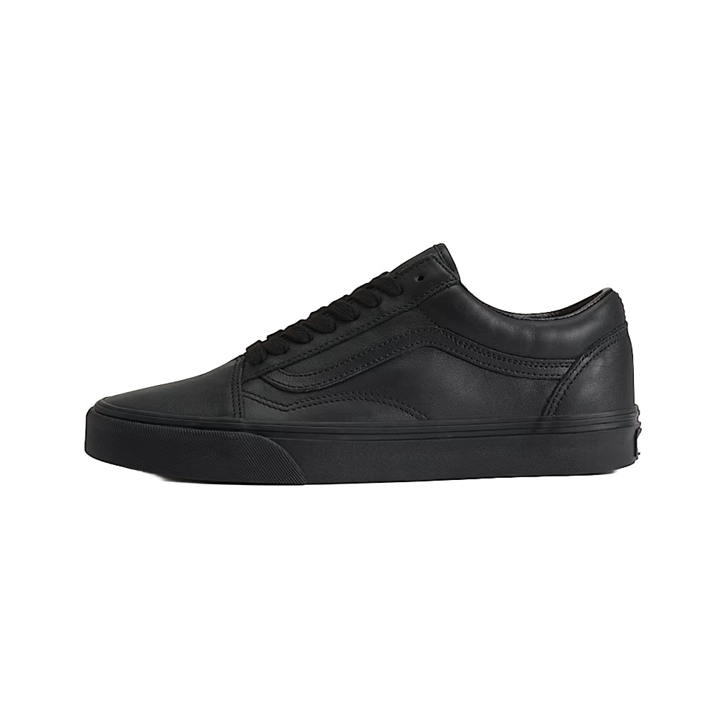 Side view of a Black leather Vans Old Skool on a white background 
