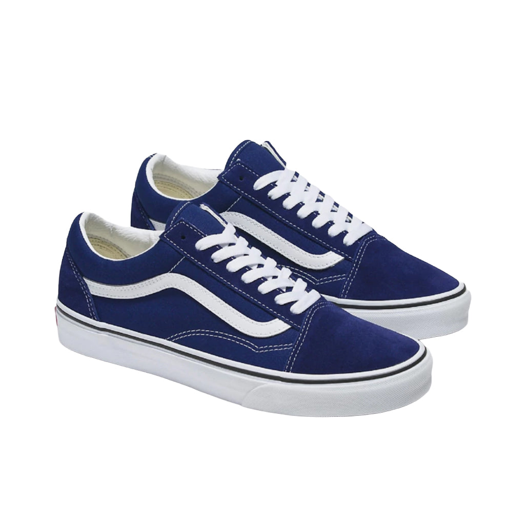 Pair of blue sneakers with white accents on a white background