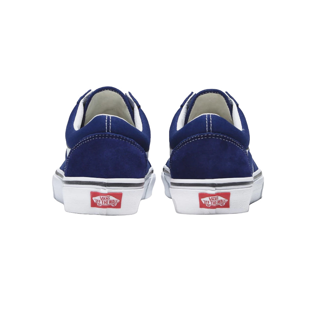 Pair of blue sneakers with red and white labels on a white background