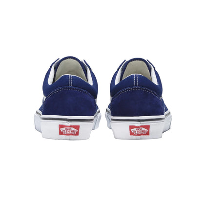 Pair of blue sneakers with red and white labels on a white background