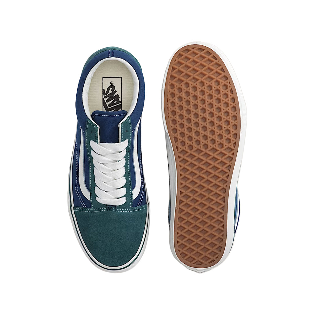Blue and green sneaker with white laces on a white background