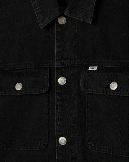 Black denim jacket with silver buttons and 'Obey' brand logo on a black background
