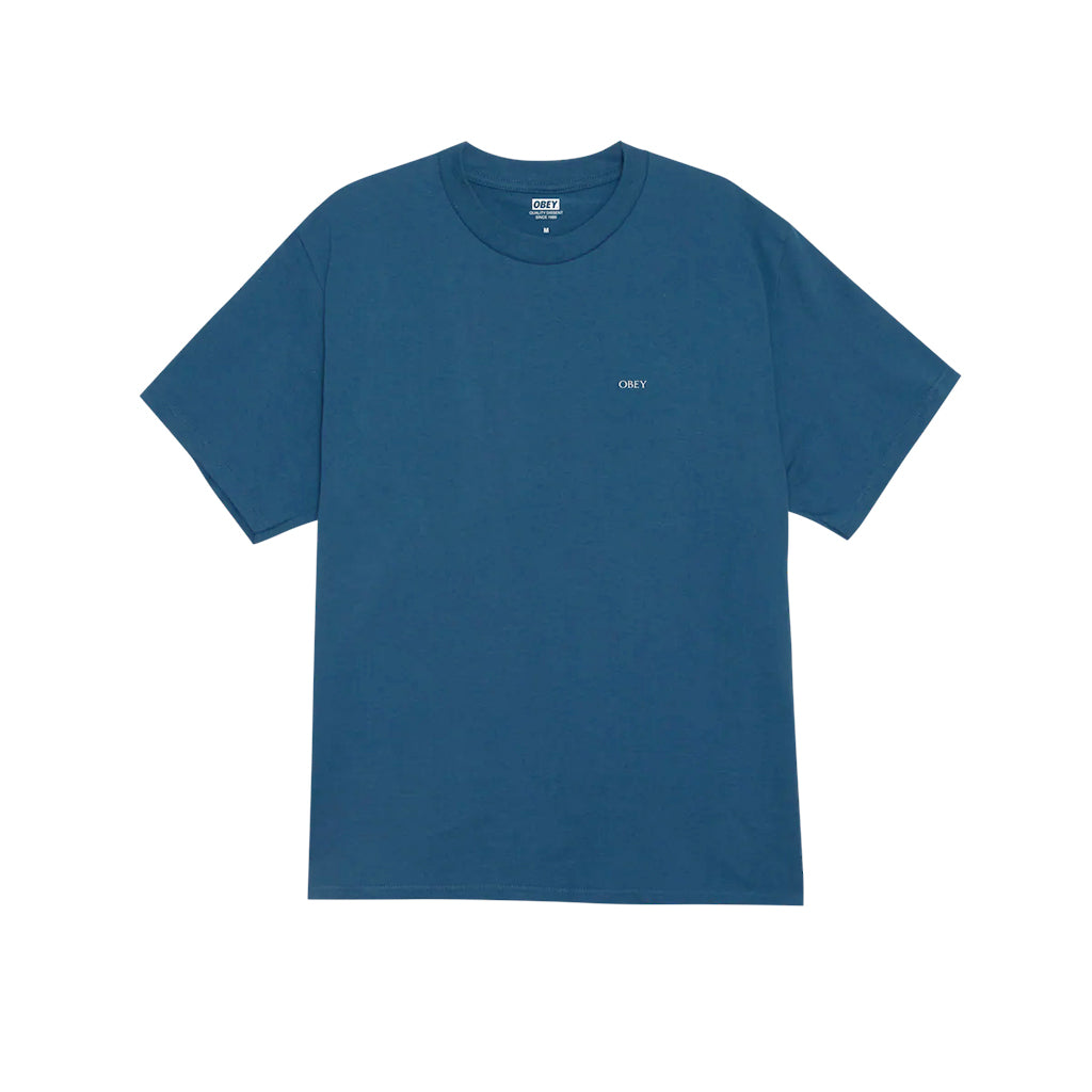 Blue t-shirt with a small logo on a white background