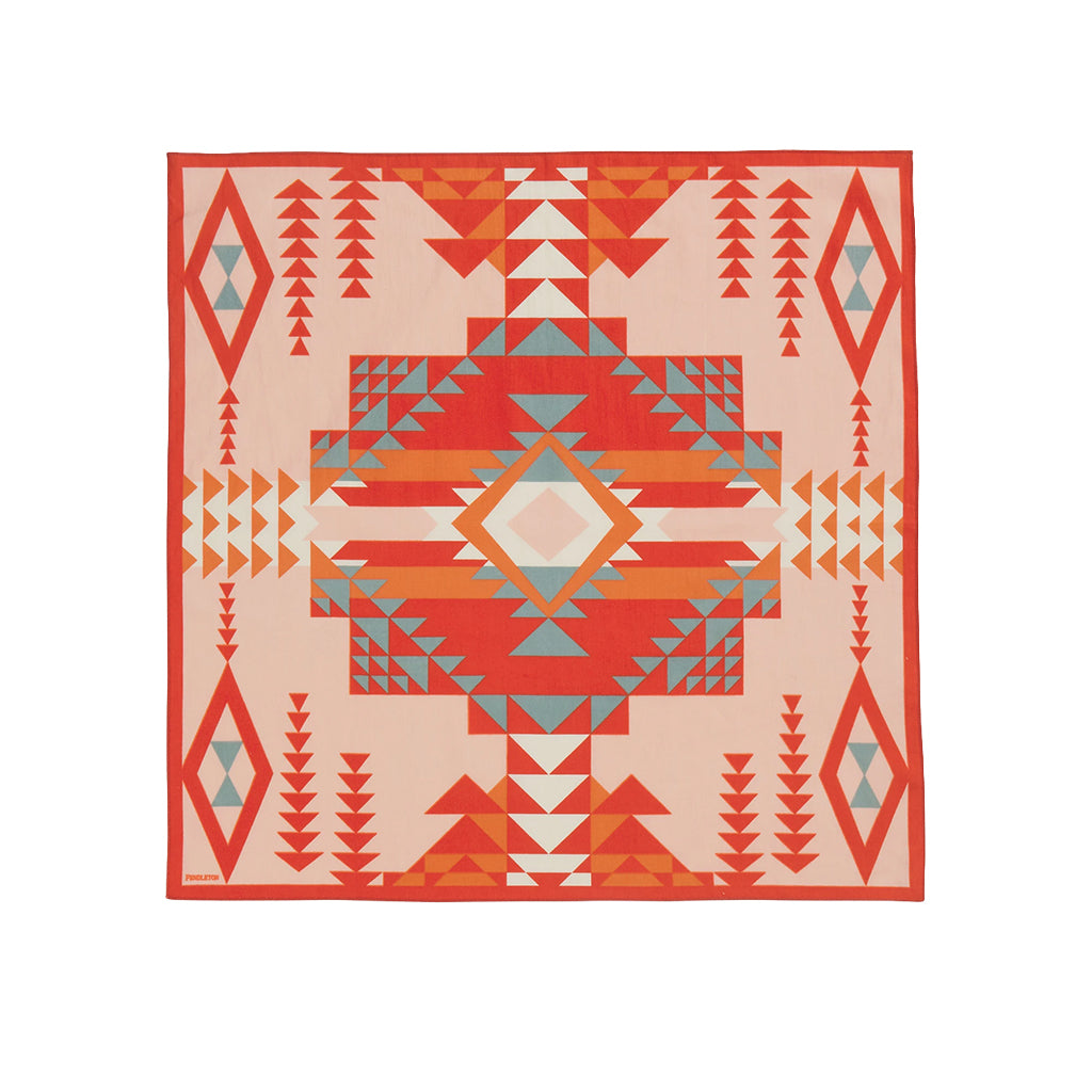 Geometric patterned bandana with red, orange, and beige colors on a white background