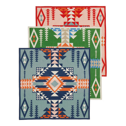 Three geometric patterned bandanas in red, green, and blue on a white background