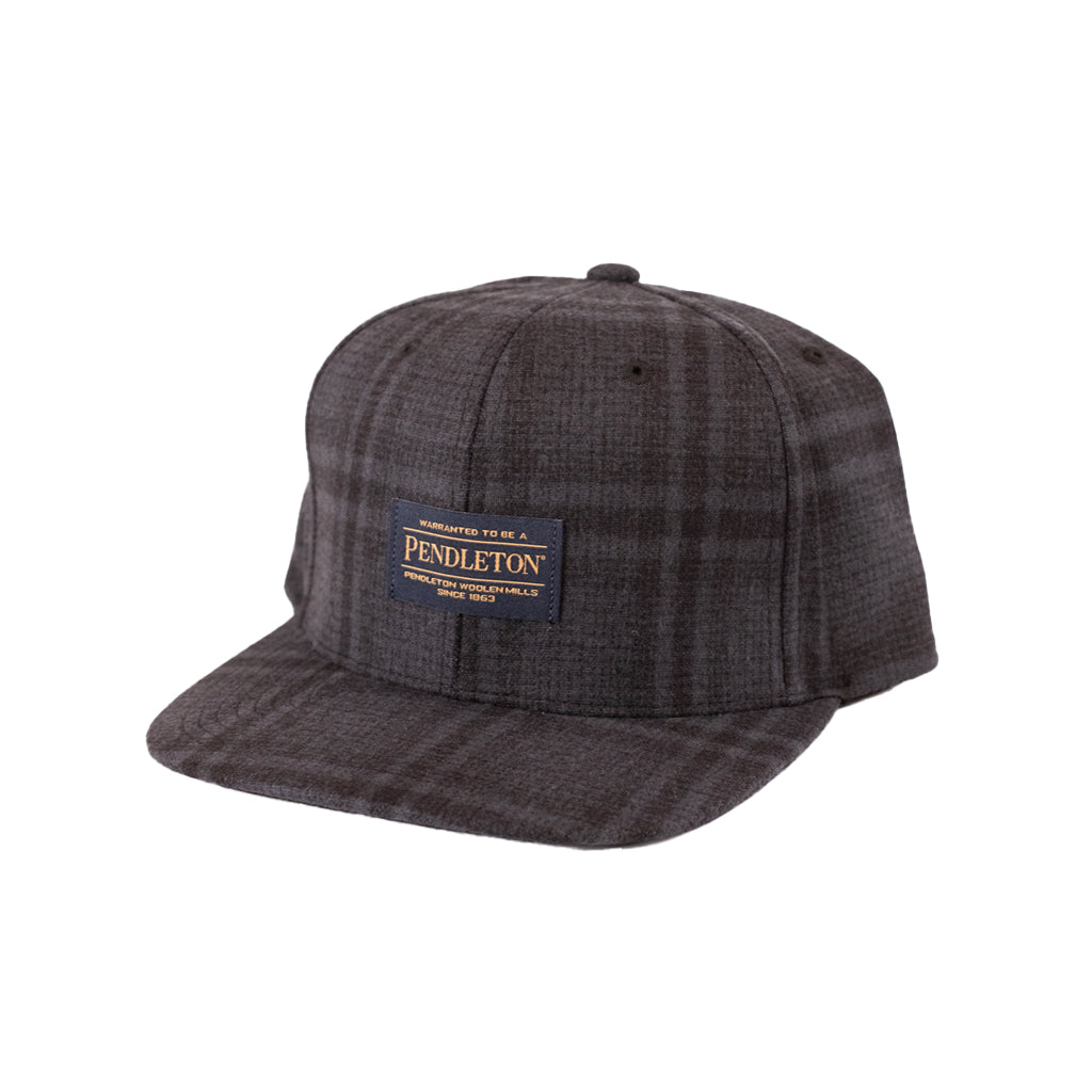 Plaid patterned cap with Pendleton logo on a white background