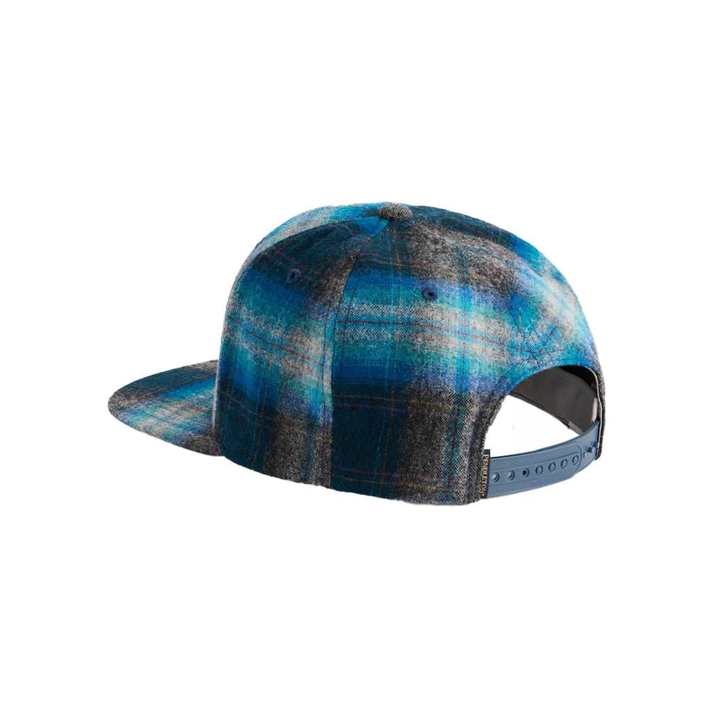 Blue and gray plaid cap on a white background