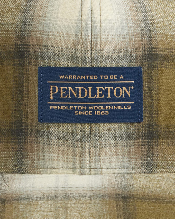 Pendleton label on a plaid fabric background