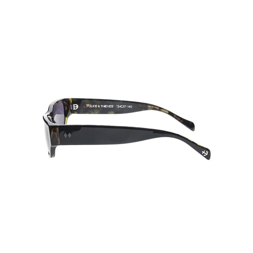 Sunglasses with 'Police & Thief' branding on a white background