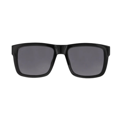 Black sunglasses with dark lenses on a white background