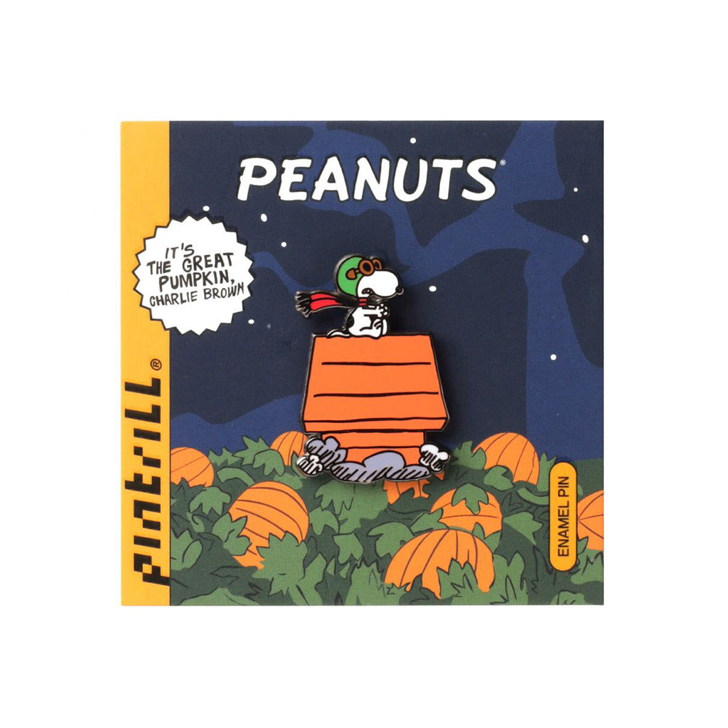 Peanuts-themed enamel pin with Charlie Brown and pumpkins on a blue background