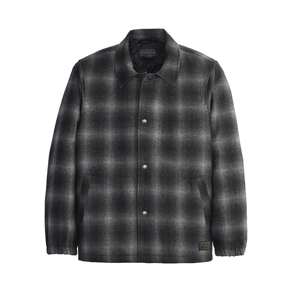 Plaid shirt with button details on a white background
