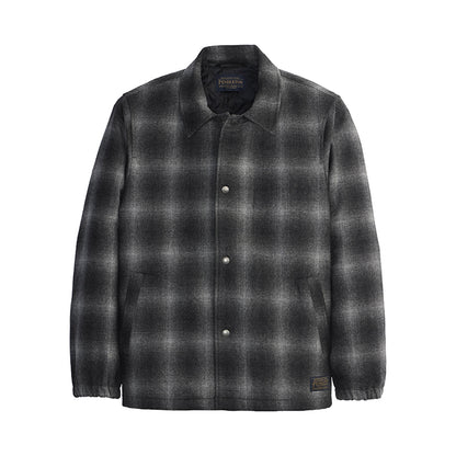 Plaid shirt with button details on a white background