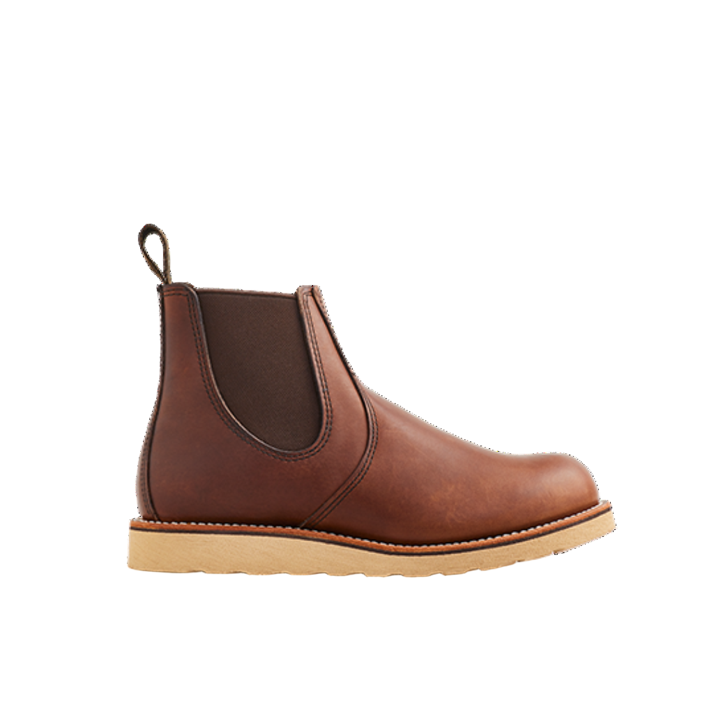 Brown leather Chelsea boot on a white background