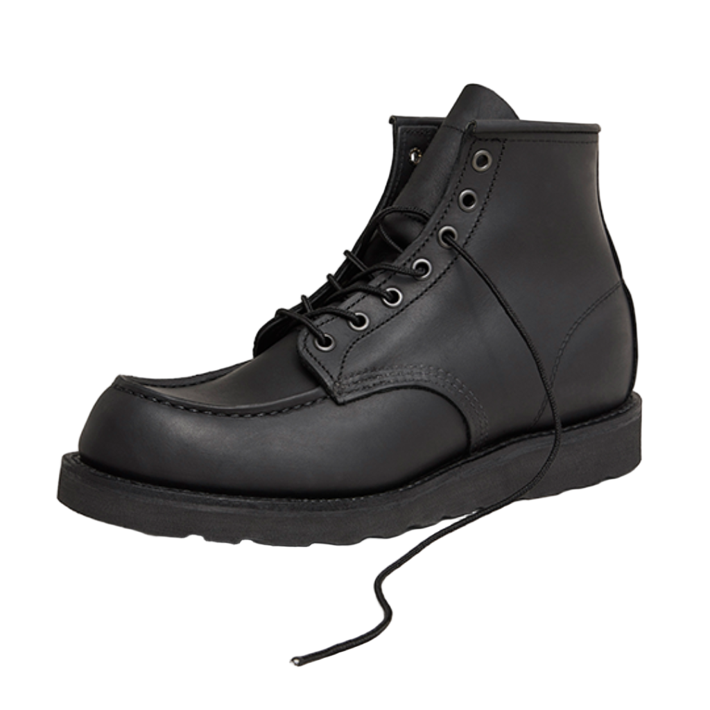 Black leather boot on a white background