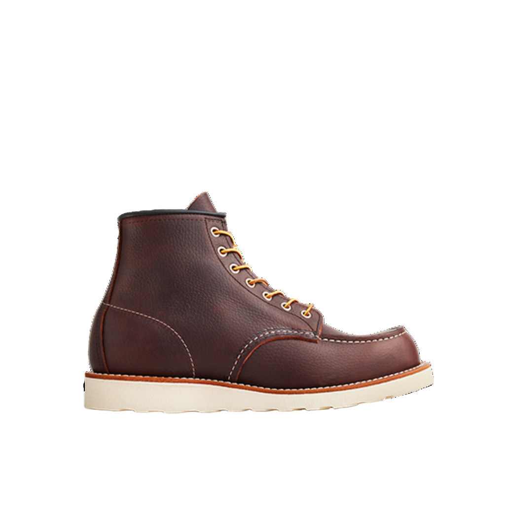 Brown leather boot with white sole on a white background