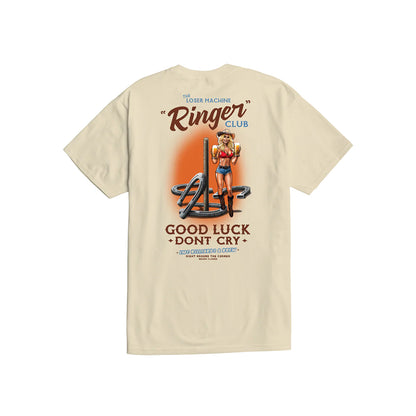 Beige t-shirt with graphic design featuring a woman, text, and logo on a white background