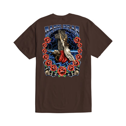 Brown t-shirt with a colorful graphic design on the back featuring roses and a cross.