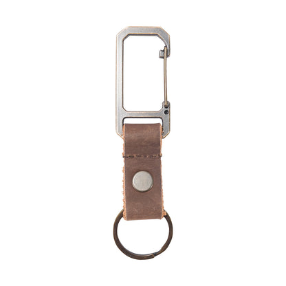 Keychain with leather strap and metal carabiner on a white background