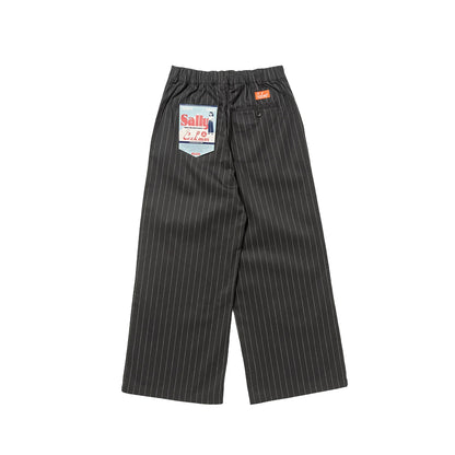 Black pinstripe pants with a brand label on a white background
