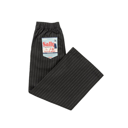 Black pinstripe pants with a label on a white background