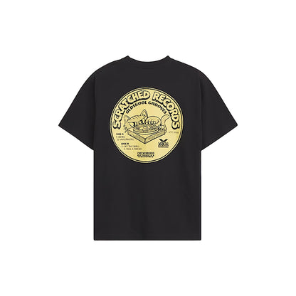 Black t-shirt with yellow graphic design on a white background