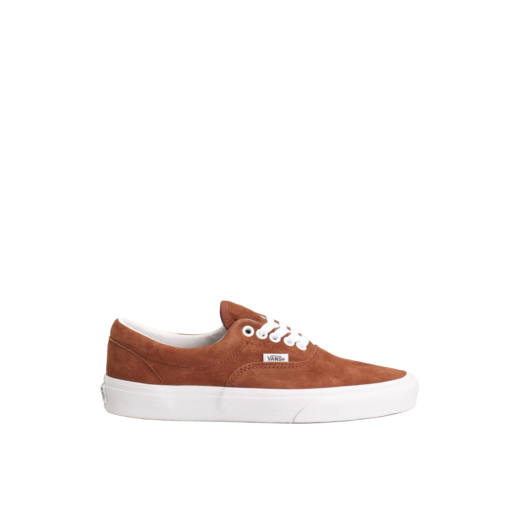Brown sneaker with white sole on a white background