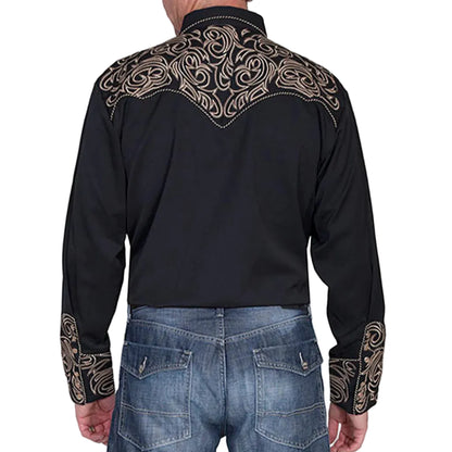 Black long-sleeve shirt with intricate gold embroidery on the back, worn by a person with blue jeans.