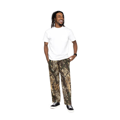 Person wearing a white t-shirt and camouflage pants on a white background