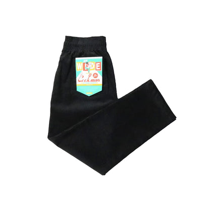 Black pants with a colorful pocket design on a white background