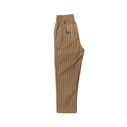 Beige striped pants with a logo on a white background