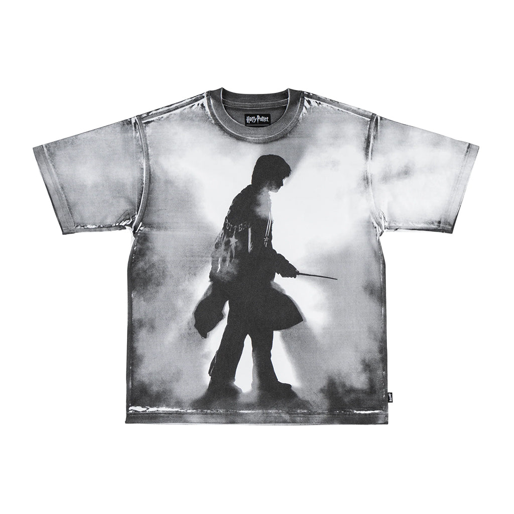 T-shirt with a black and white graphic of a character holding a wand on a white background
