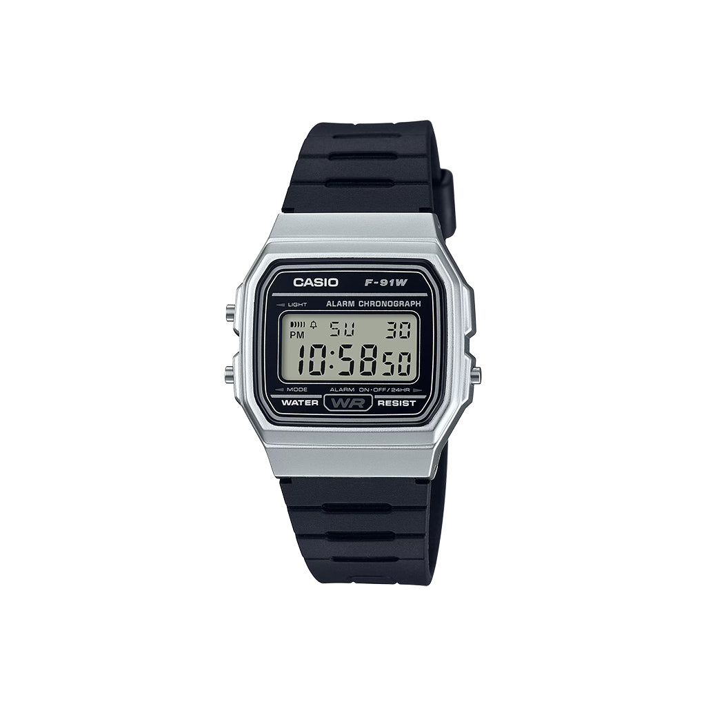 Casio digital watch with black strap on a white background