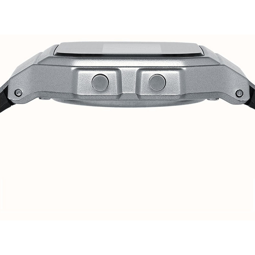 Close-up of a silver digital watch on a white background