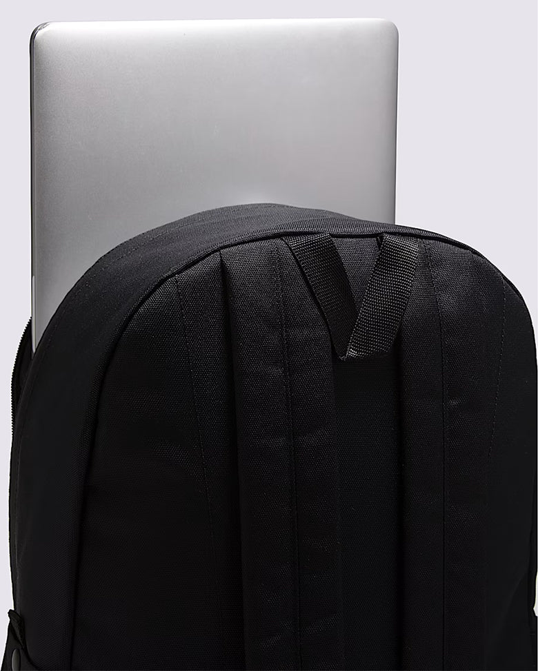 Black backpack with a laptop slot on a light gray background