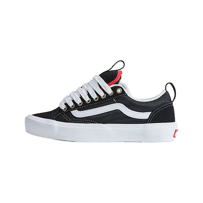Black and white sneaker with red accents on a white background