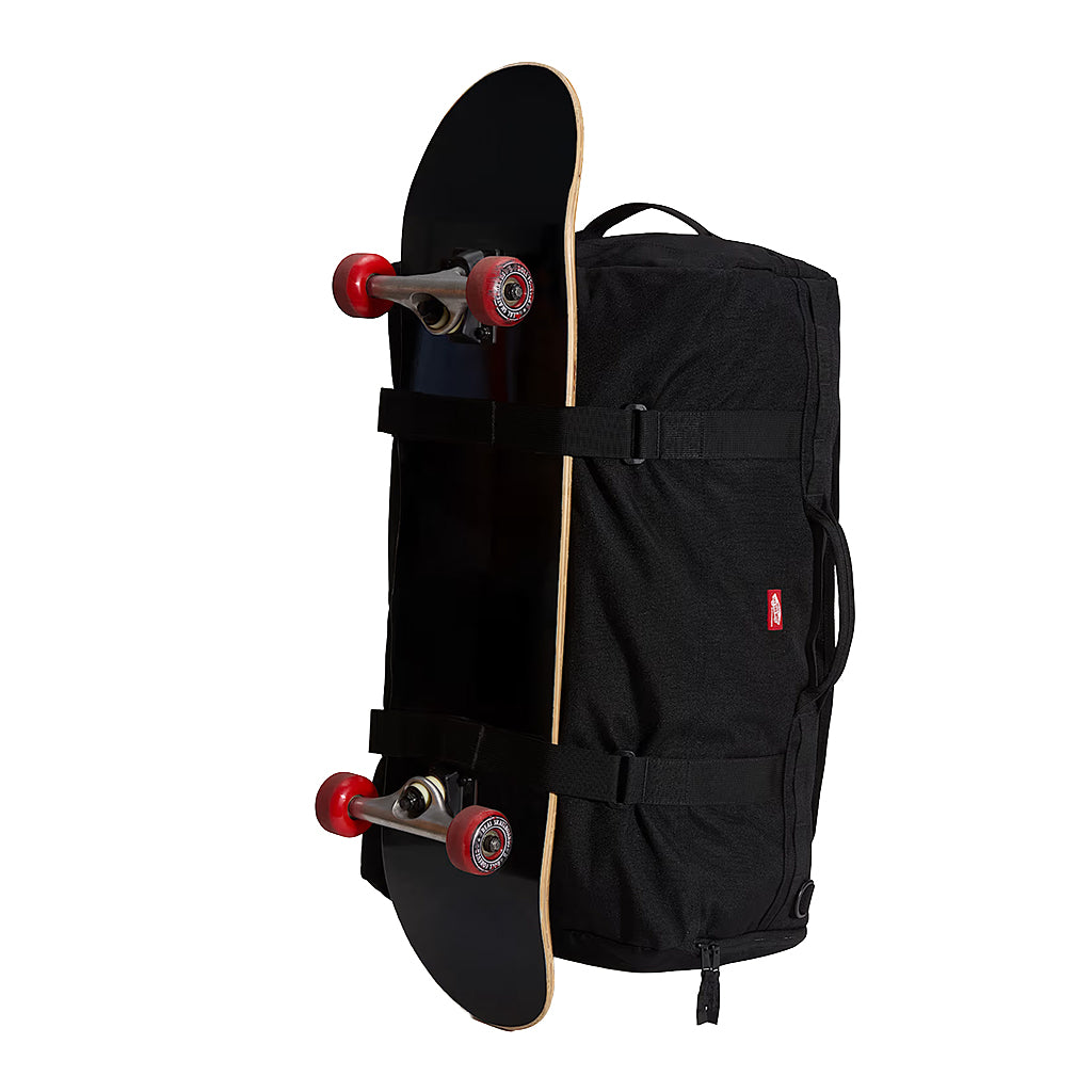 Black skateboard and backpack on a white background