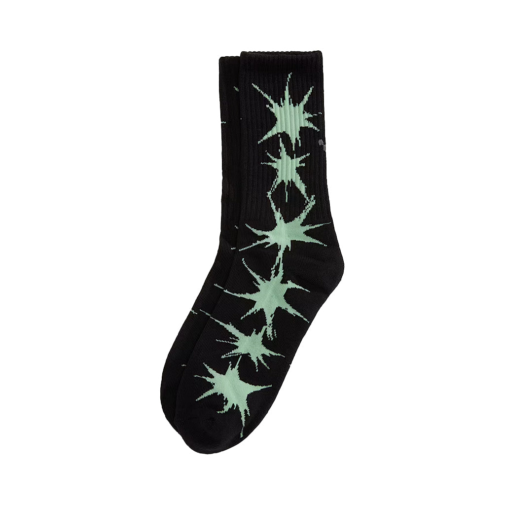 Black socks with green abstract patterns on a white background