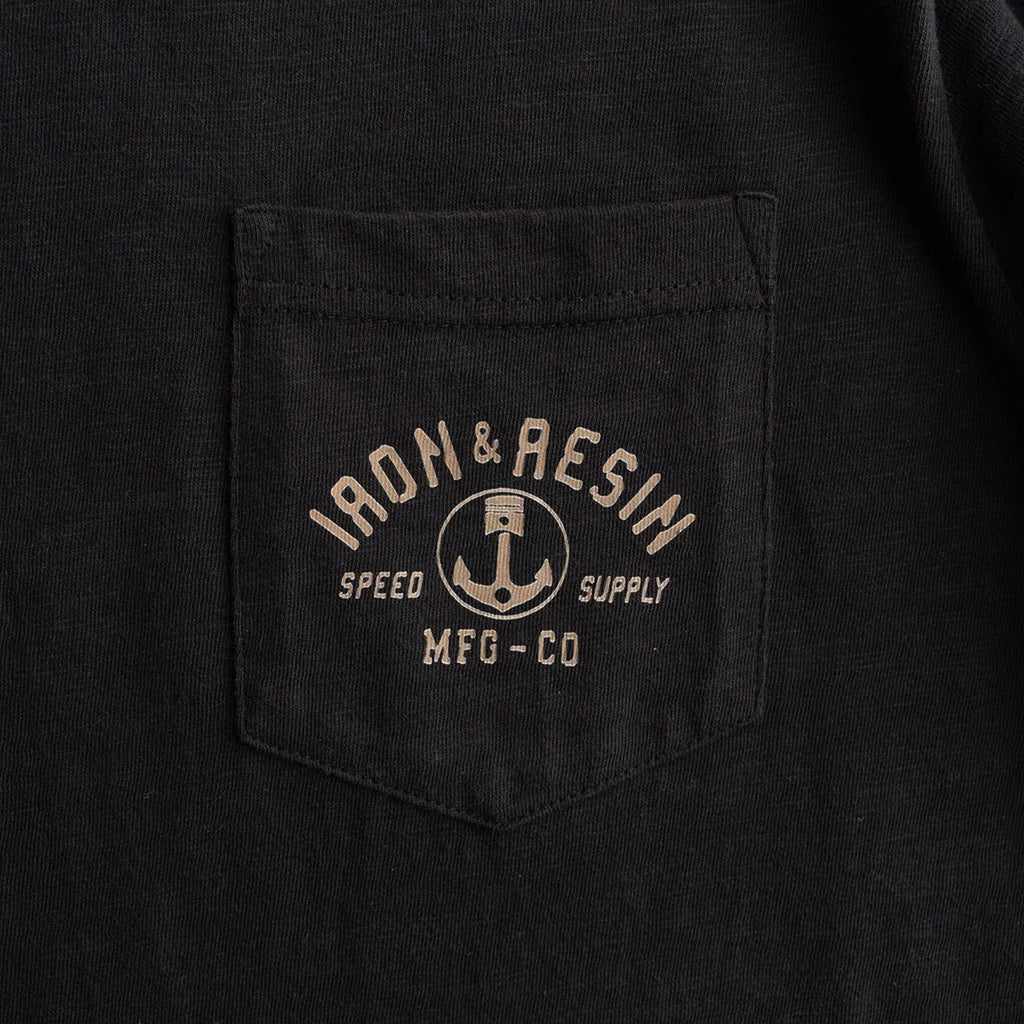 Black t-shirt with 'Iron & Resin' logo on a pocket