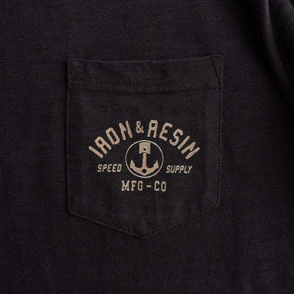 Black t-shirt with 'Iron & Resin' logo on a pocket